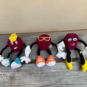 Set of three Plush California Raisin dolls