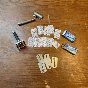 2 safety razors with bonus blades in boxes
