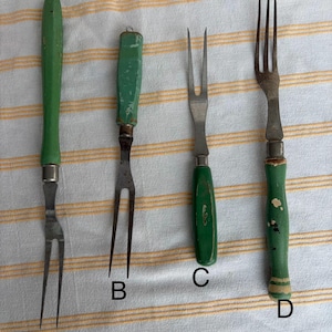 May include: A set of three ceramic mugs with a speckled, matte finish. The mugs are in shades of cream, light gray, and dark gray. Each mug has a simple, minimalist design, perfect for coffee or tea.