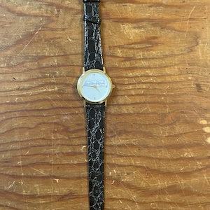 Retro watch with black leather wristband