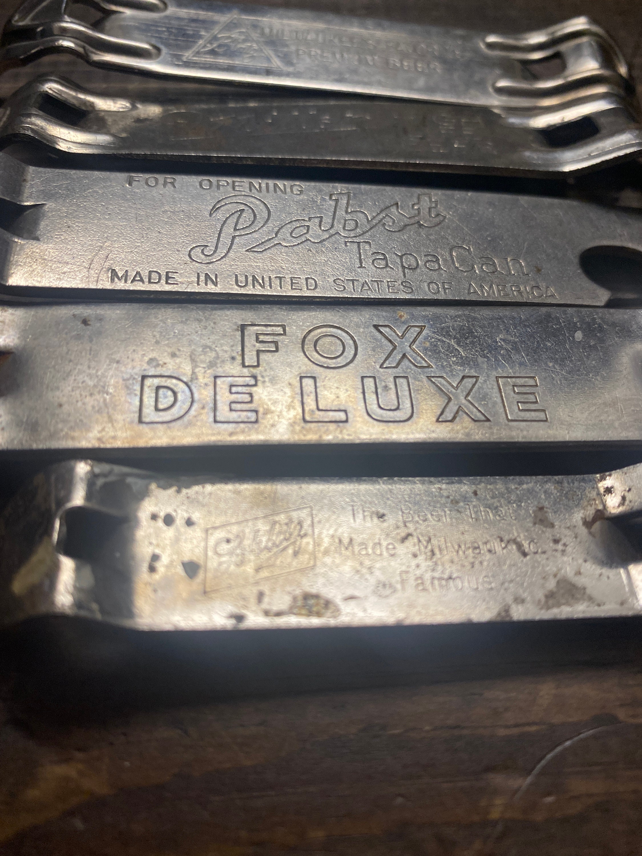 5 Vintage metal bottle openers with beer brands