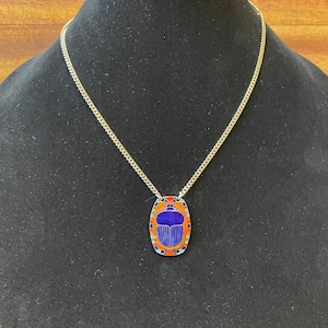 Scareb Beatle pendant on necklace