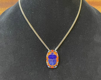 Scareb Beatle pendant on necklace