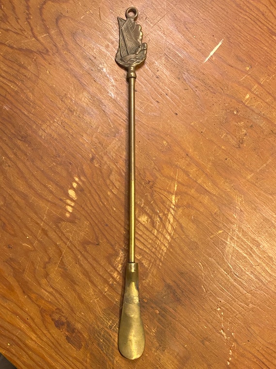 Long Brass Shoe Horn with Ship on one end - image 1