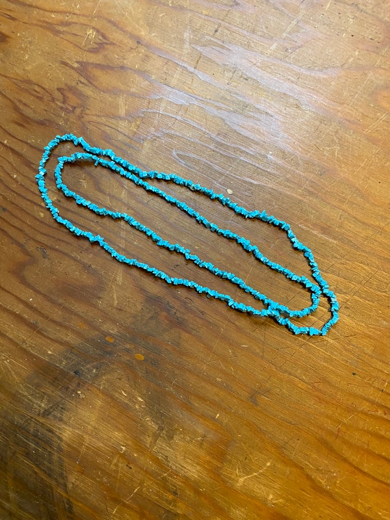 Aqua colored long necklace