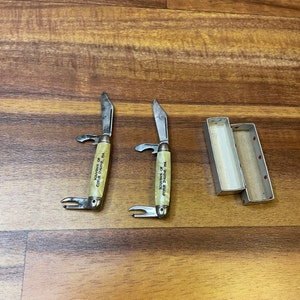 Set of two small souvenir imperial knives mother of pearl with advertising
