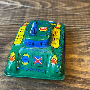Piccolo giocattolo di latta giapponese