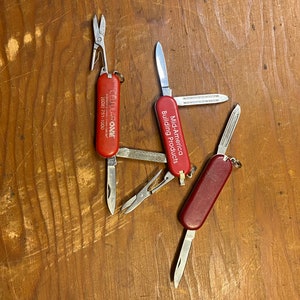 Set of three red Pocket or keychain knives