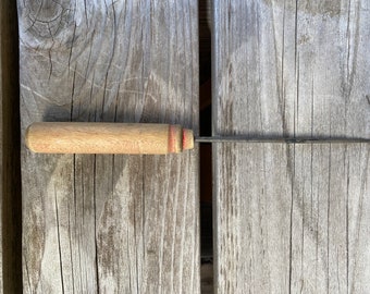 Ice Pick with round wood handle with faded red paint remnants