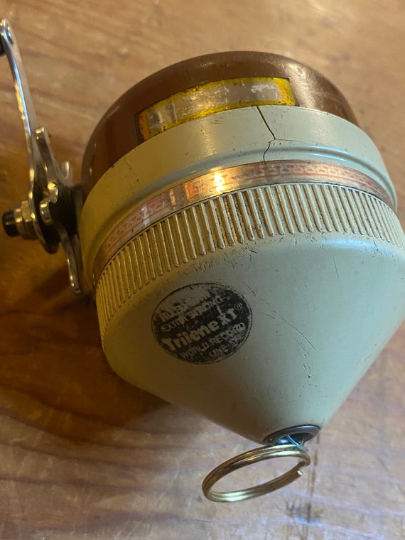 Older Brown and Tan Zebco Reel -  Finland