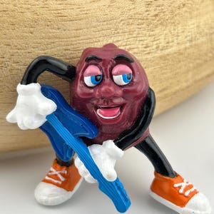 California Raisin with Blue Guitar