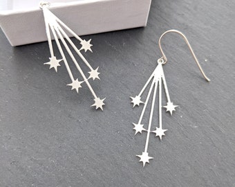 Pendientes de estrellas fugaces de plata, pendientes de estrellas fugaces, pendientes colgantes de declaración, pendientes minimalistas, pendientes colgantes, joyas navideñas