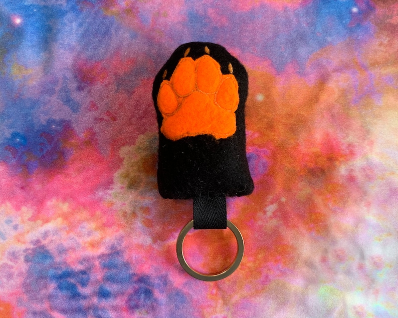 Squeaky Lucky Canine Paw Plush Keychain Black & Neon Orange