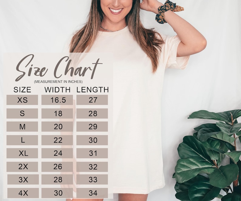May include: A cream-colored t-shirt with a size chart overlay. The chart lists sizes XS to 4X, with width and length measurements in inches. The model is wearing the t-shirt.