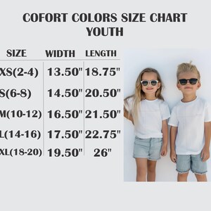 The image is a size chart for youth, showing the measurements for different age groups. It includes a table with the age groups (XS/2-4, S, 6-8, M, 10-12, L, XL/18-20) and corresponding widths (13.50, 14.50, 16.50, 21.50, 17.50, 22.75) in inches. The chart also includes a photograph of two children wearing matching white t-shirts and sunglasses.