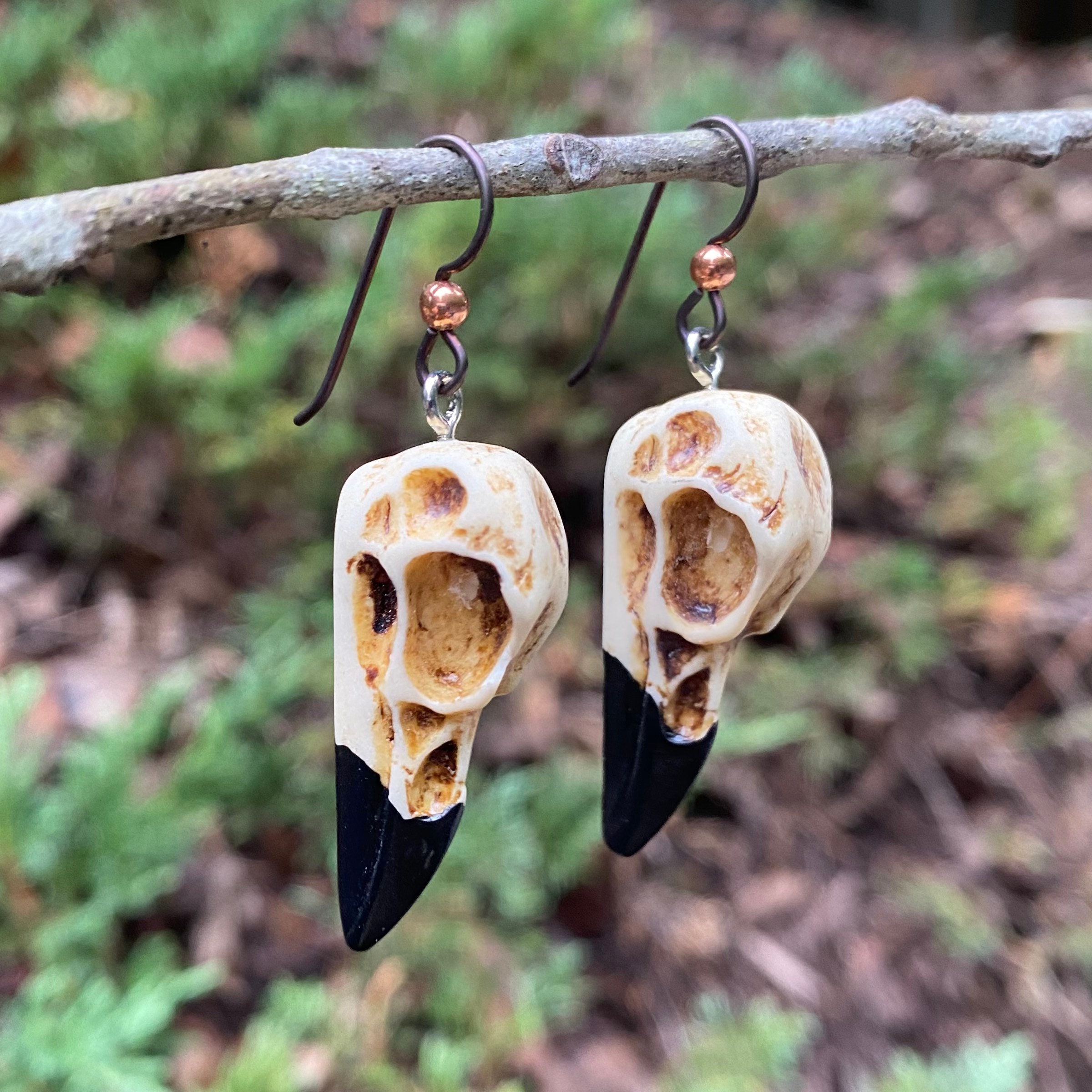 Bird online skull earrings