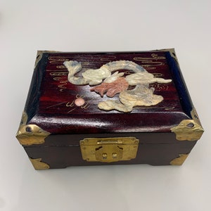 vintage dime store hand crafted rose wood jewelry box with dragon soap stone design.