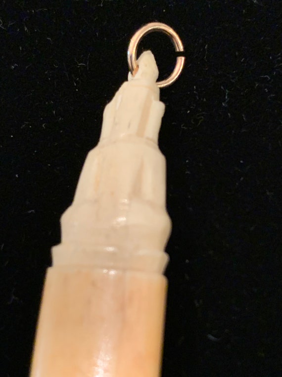 vintage dime store hand carved bone horn with sit… - image 2