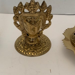 Vintage solid brass incense burner’s assorted shapes.
