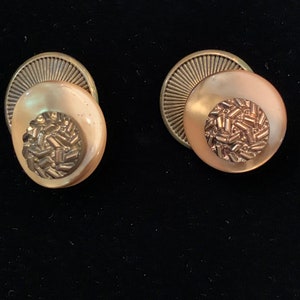 Vintage dime store hand crafted button clip on earrings.