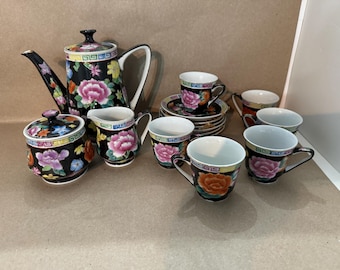 Vintage porcelain black floral tea set.