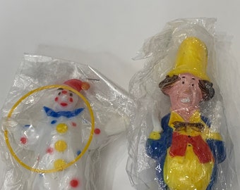 Vintage dime store clown and ring master statue/cake topper set.