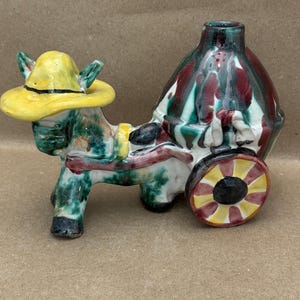 Vintage dime store ceramic hand painted colorful donkey cart statue.