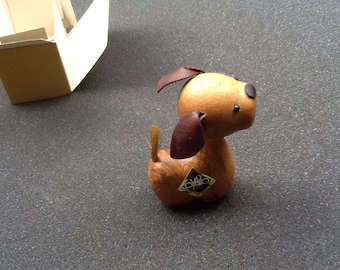 1960’s dime store wooden dog figure with leather ears .