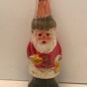 Vintage dime store Santa Claus wax candle.