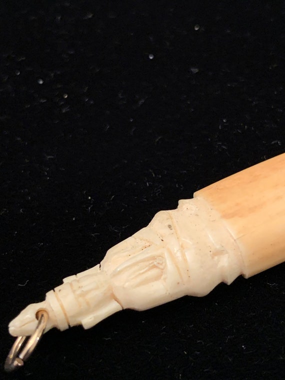 vintage dime store hand carved bone horn with sit… - image 5