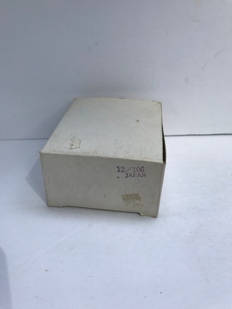Vintage wood salt and pepper shaker Japan NOS boxed.