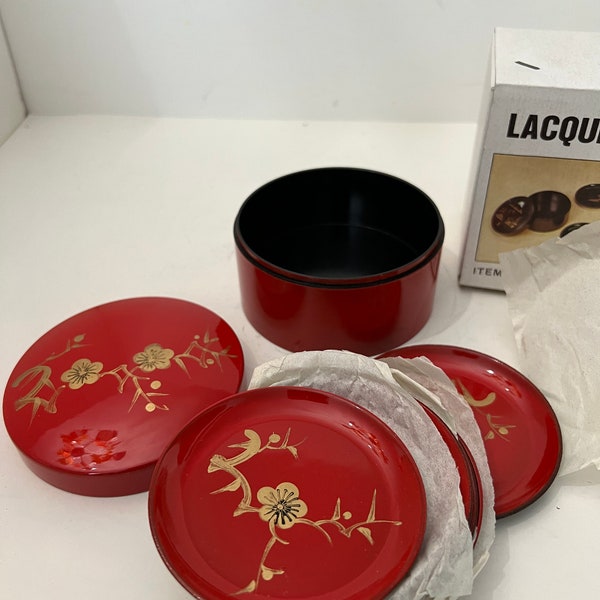 vintage dime store Asian lacquer ware coaster set in storage canister.