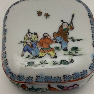 vintage dime store porcelain miniature  trinket box with children  performing kung Fu design  SQUARE.