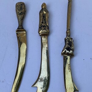 vintage dime store miniature solid brass sword set of three Korea