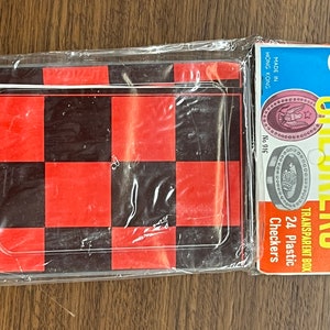 vintage dime store toy checkers set  No. 916 in original package with header card.