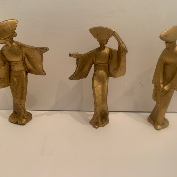 Vintage gold color metal art deco statues very heavy. omc  Otagiri mercantile company Japan