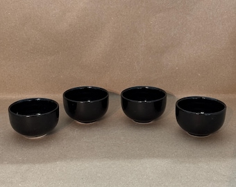 vintage dime store’s glossy black sake/teacup set of 4.