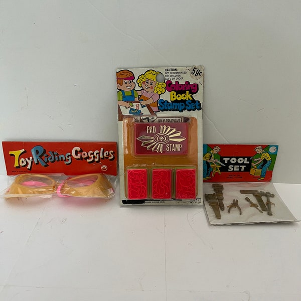 Vintage dime store toy lot 3 pieces toy riding goggle, coloring book stamp set, tool set. You get all 3 toys listed.