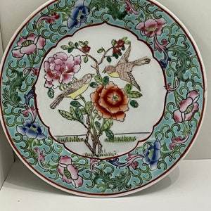 Vintage dime store hand painted porcelain 6-inch plate with birds in flower bush