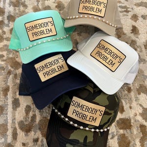 Custom Somebody's Problem Trucker Hat: Metallic Patch Country Music Hat