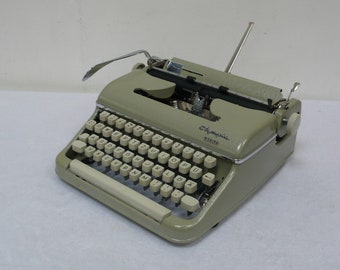 Olympia Typewriter Monika manual cleaned + works very good, w/ Wooden Case from 1958, Seafoam Green cleaned and working