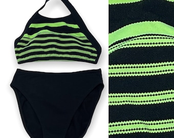May include: Black and lime green striped bikini top and bottom. The top is a halter style with a wide band. The bottom is a high-waisted style.
