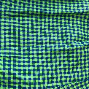 May include: A fabric with a repeating checkered pattern. The pattern features a vibrant green and navy blue color scheme. The fabric is likely used for clothing or home decor.
