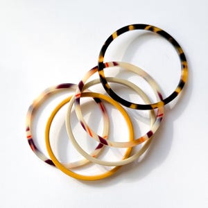 Braccialetti rigidi in tartaruga: set impilabile in acetato italiano