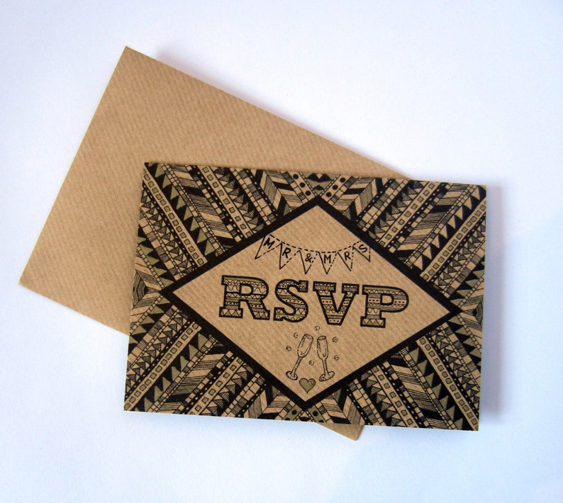 May include: A brown card with a black and white geometric pattern. The card has a diamond shape in the center with the text "RSVP" in black letters. The text "MR & MRS" is written in black letters on a banner above the diamond.