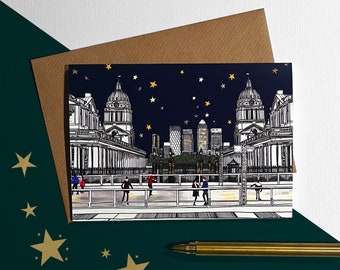 May include: A Christmas card featuring a black and white illustration of the National Gallery in London with a skating rink in front of it. The illustration is set against a dark blue background with gold stars. The skyline of London is visible in the background.