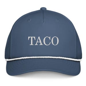 May include: A blue baseball cap with the word "TACO" embroidered in white. The cap has a white rope detail along the brim.