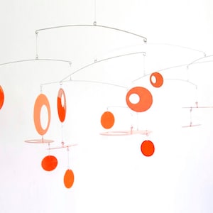Eclipse Mobile, Mid-century modern, large-sized metal hanging art, stainless steel and powder coated aluminum in orange