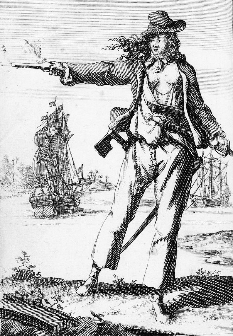 May include: A black and white engraving of a woman pirate holding a pistol and a sword. She is wearing a hat and a jacket, and her hair is long and flowing. She is standing on a beach with a ship in the background.