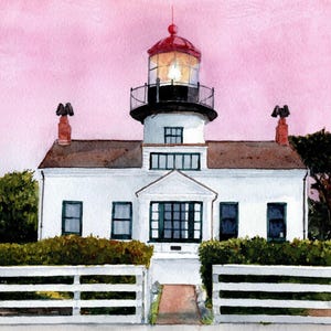 May include: A white lighthouse with a red roof and a black lantern. The lighthouse is surrounded by a white picket fence and green bushes. The sky is a soft pink color.